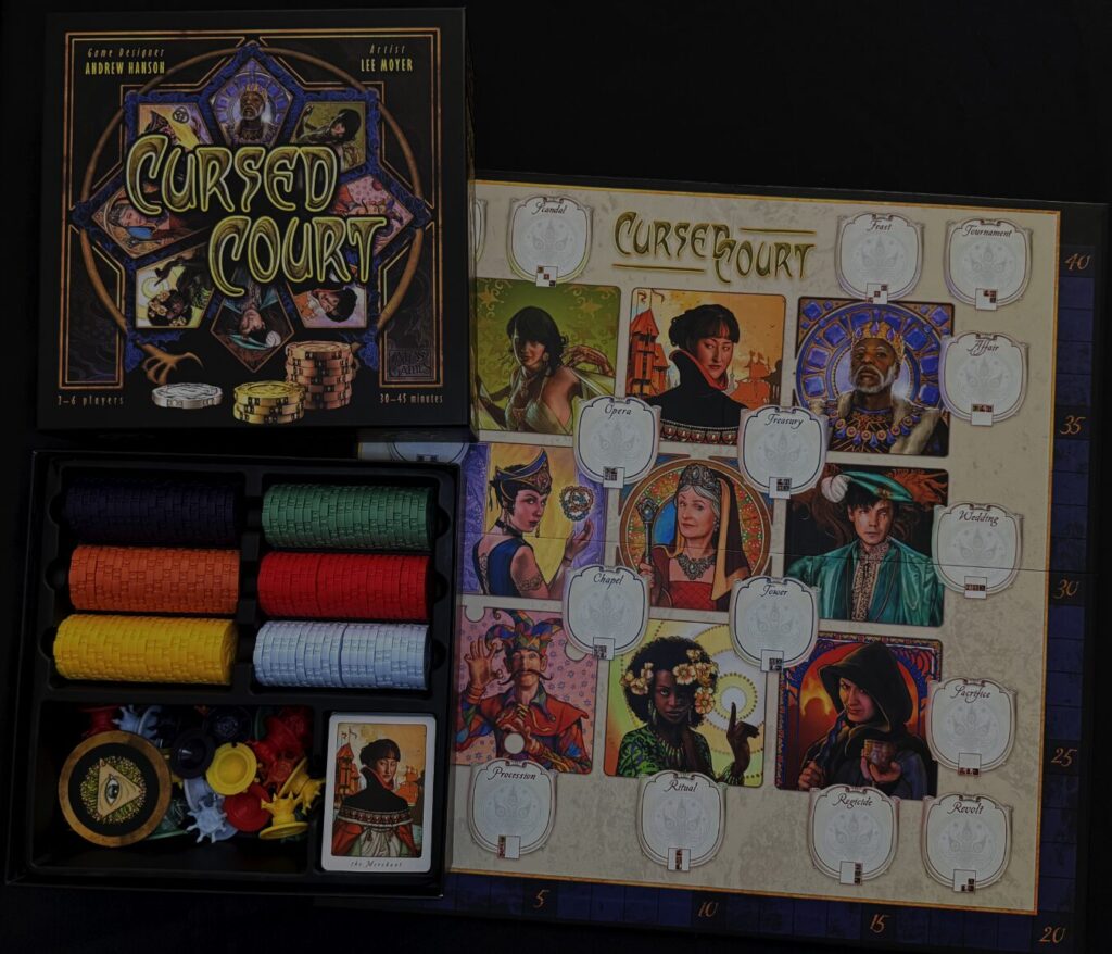 Overhead view of the Cursed Court board game box, open to reveal its contents.